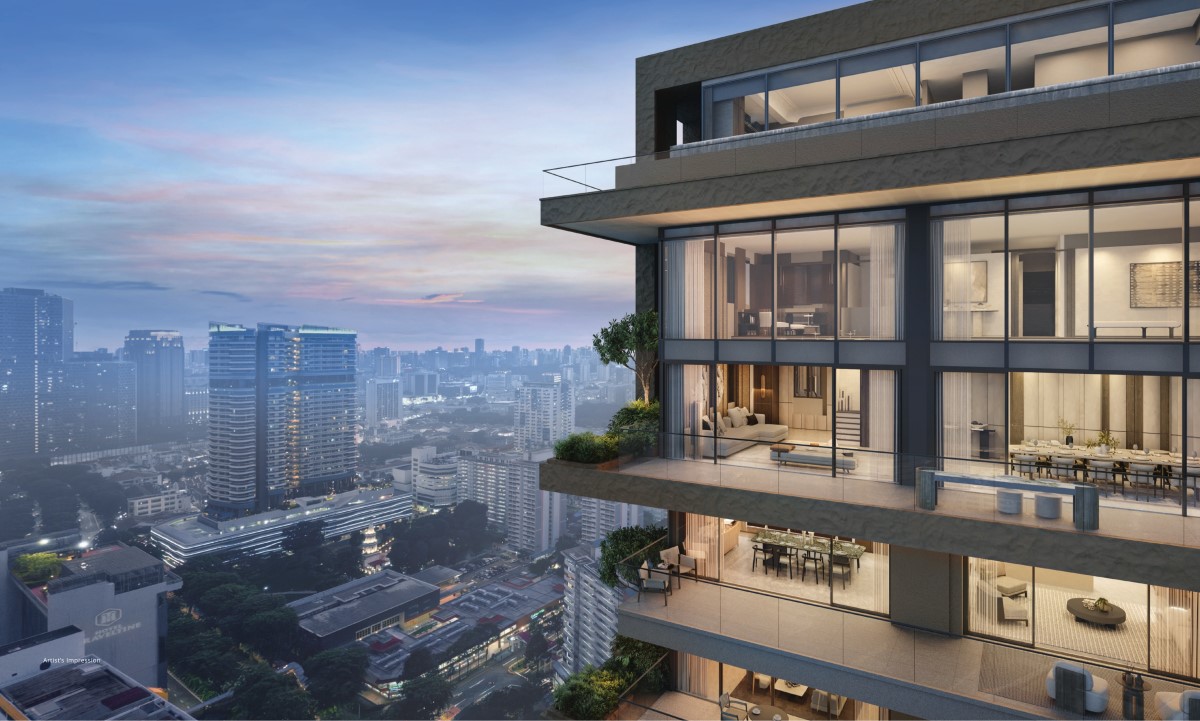 Aurea residential tower at dusk above the conserved Golden Mile Complex, Beach Road