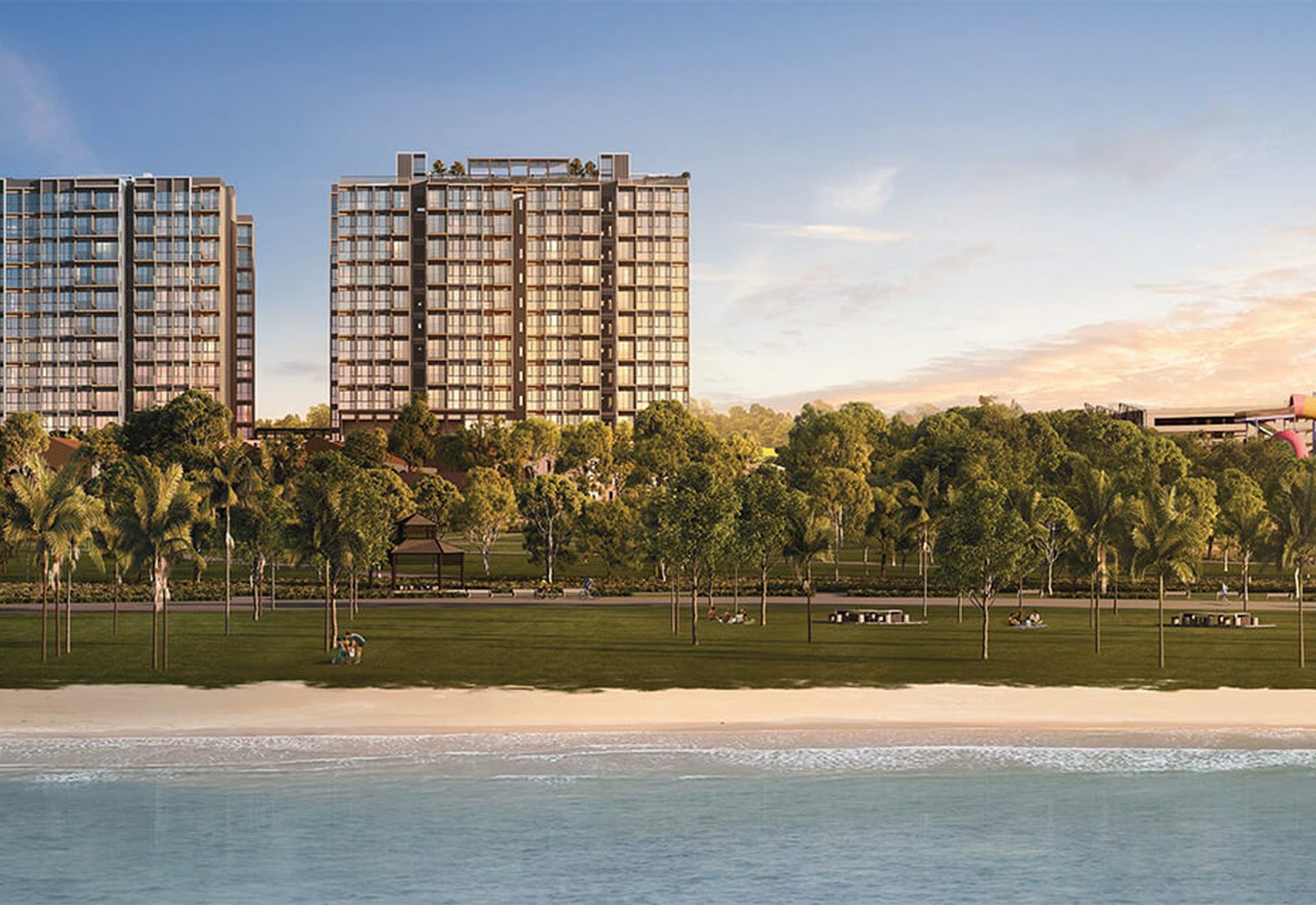 Coastal Cabana EC seen across the lawn and beach of Pasir Ris Park